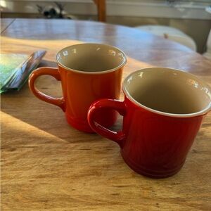 Le Creuset Ceramic Mugs in Bright Orange and Cherry Red - Set of 2